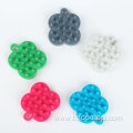 Four-leaf clover shaped silicone shampoo comb